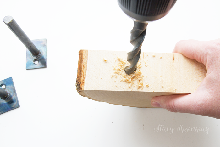 drilling-hole-in-tree-stump-for-shelf