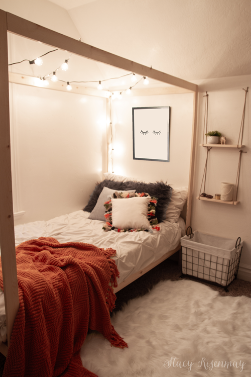 canopy bed with string lights