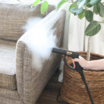 steam cleaning a sofa