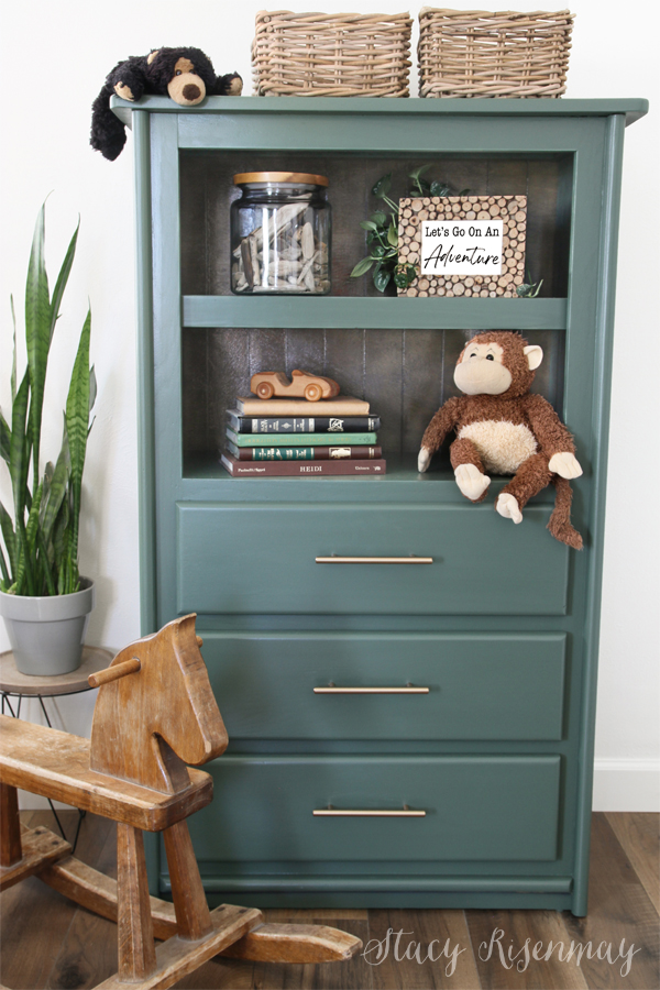 an armoire styled with childrens items