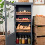 cabinet with veggies stored inside