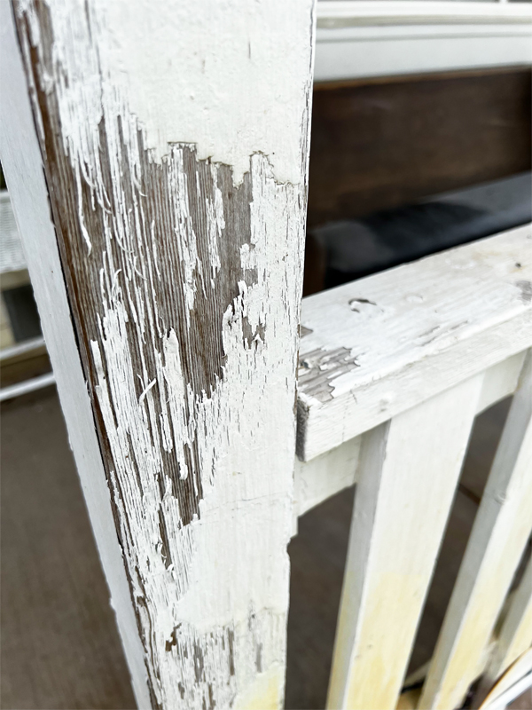 porch railing with peeling paint