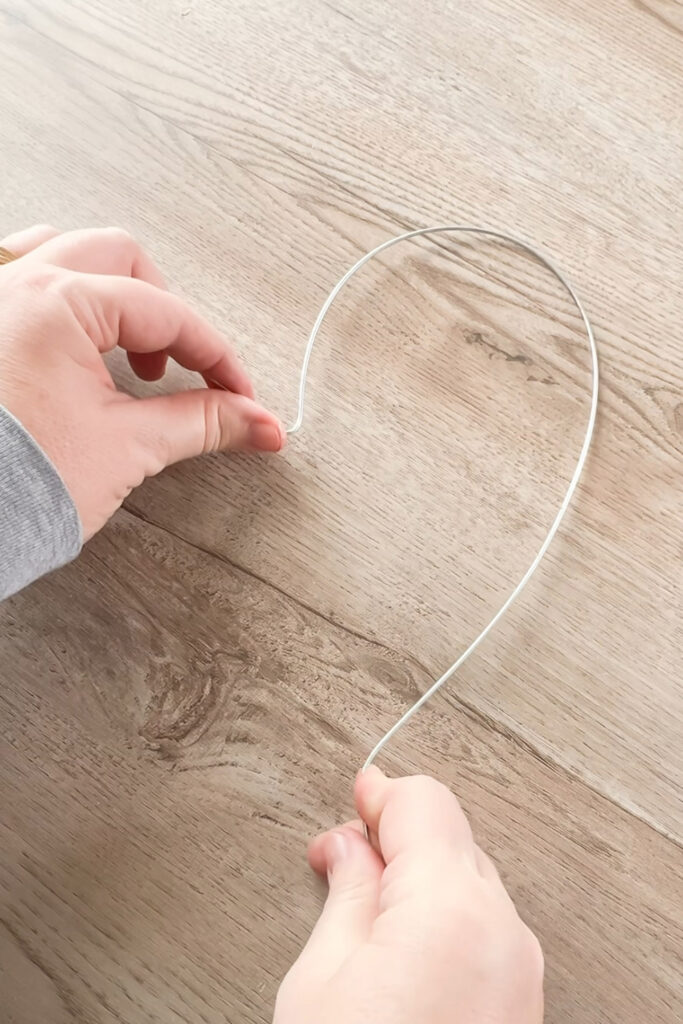 bending the wire into a heart shape