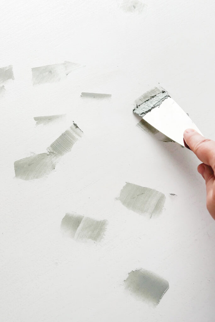 adding bondo to dents in an old door