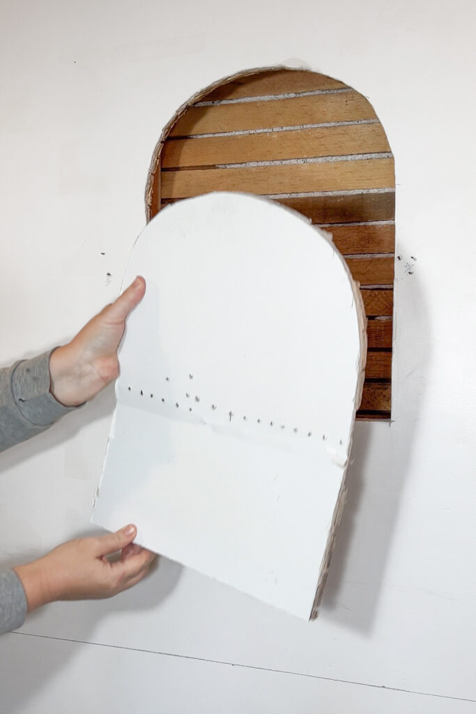 cutting out an arch in the wall