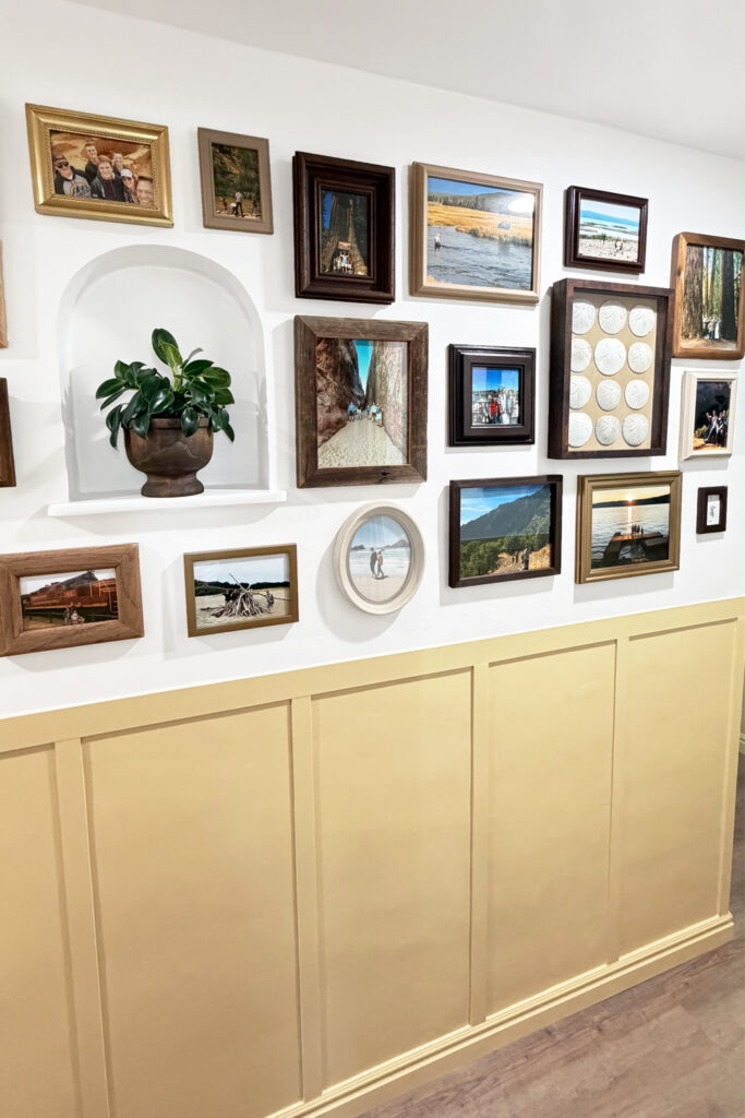 gallery wall full of travel photos
