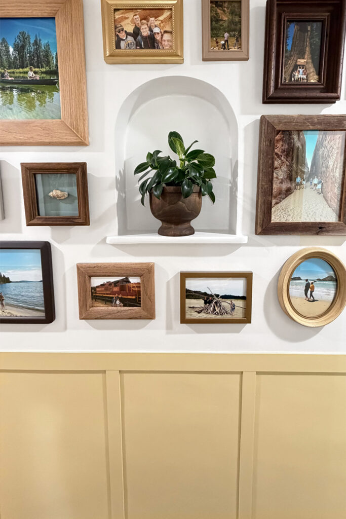 a recessed arched nook with frames around it