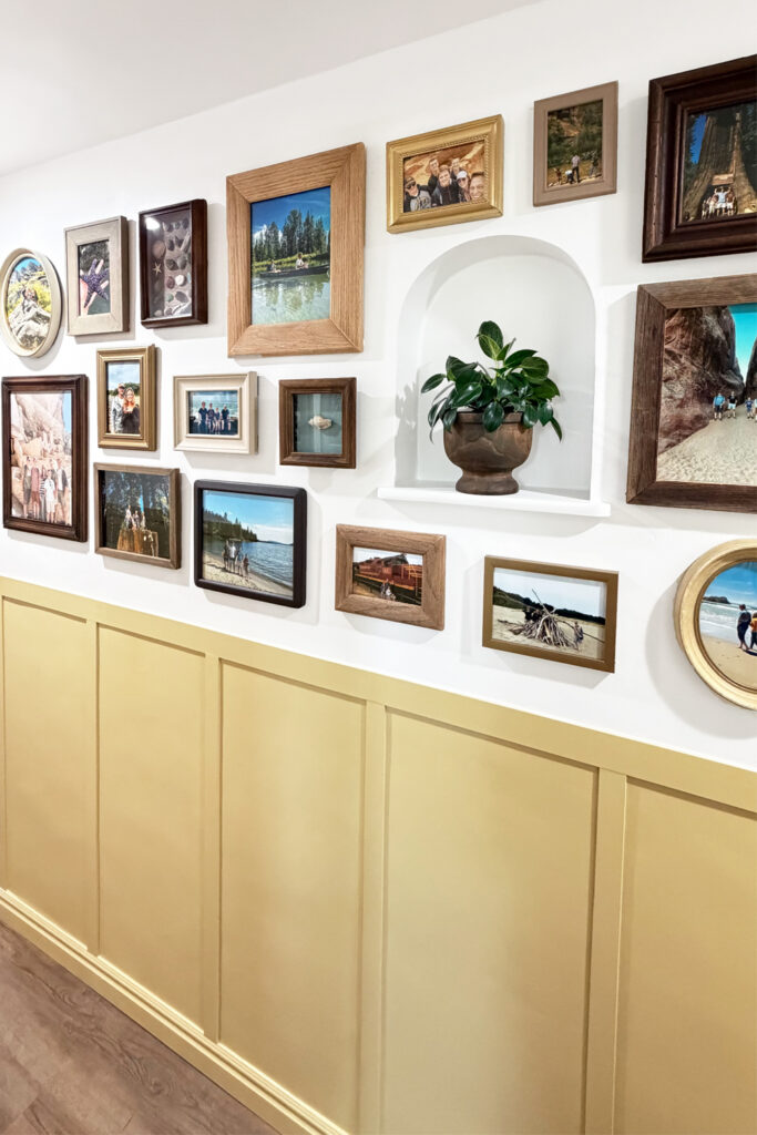 yellow wall trim and a gallery wall