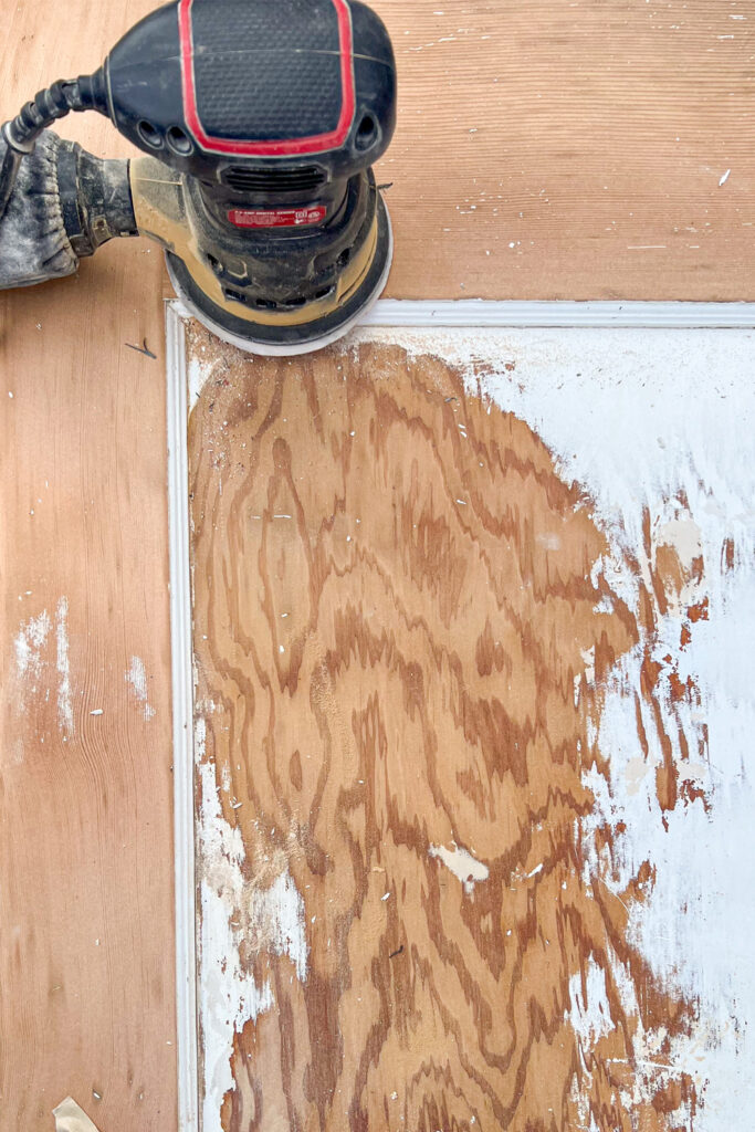 sanding an old door