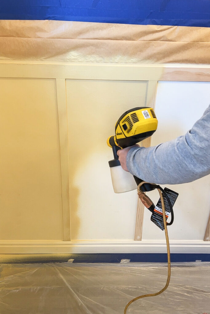 painting wall trim yellow with paint sprayer