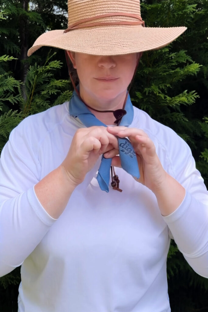 putting on cooling cloth around neck